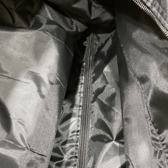 NWOT.  Nylon rolling carry-on bag. - Picture 9 of 13